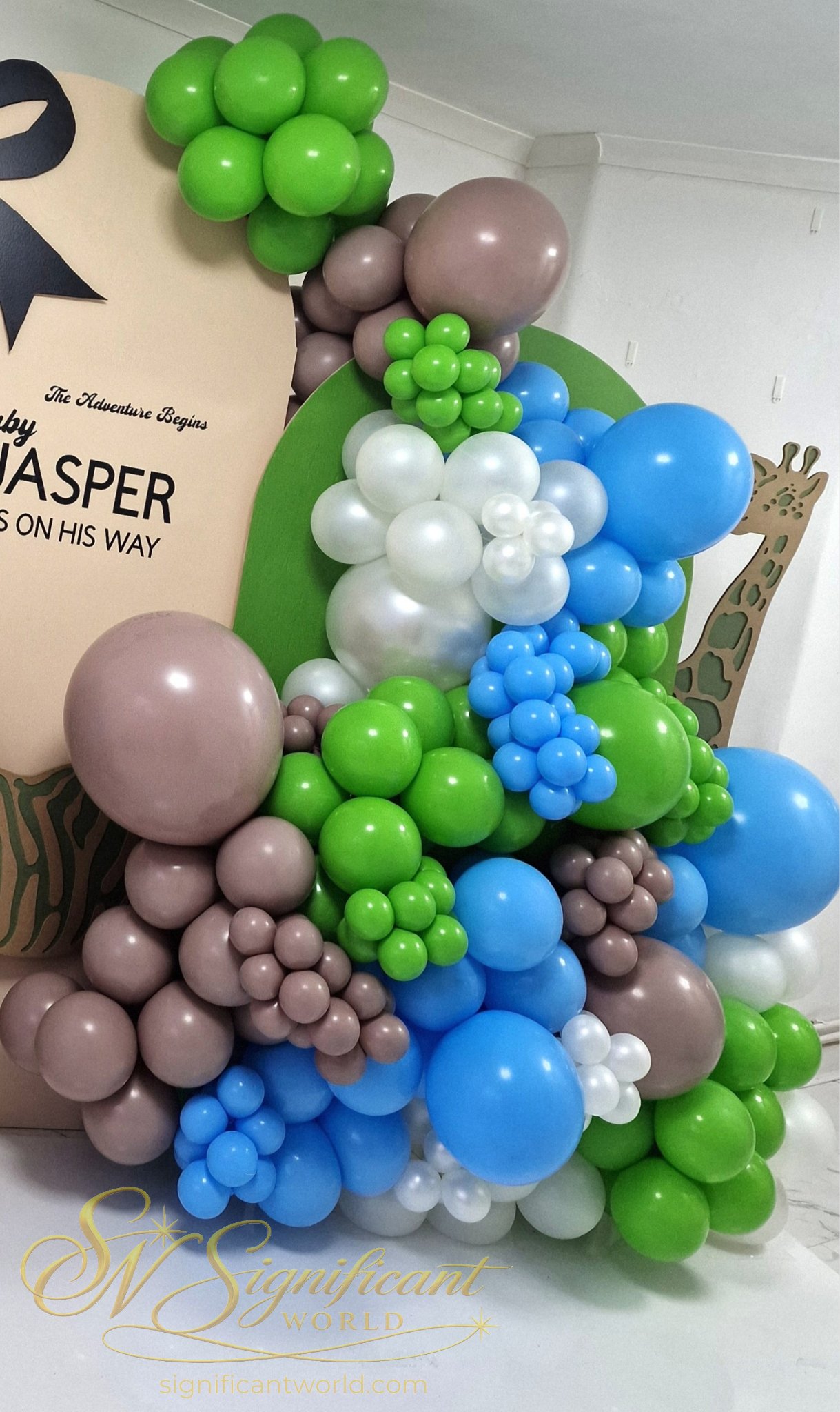 Organic balloon garland in lime green sky blue dusty mauve and pearl white for safari baby shower by Significant World Northamptonshire